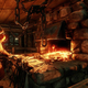 A blacksmith hammers at a sword in a forge.